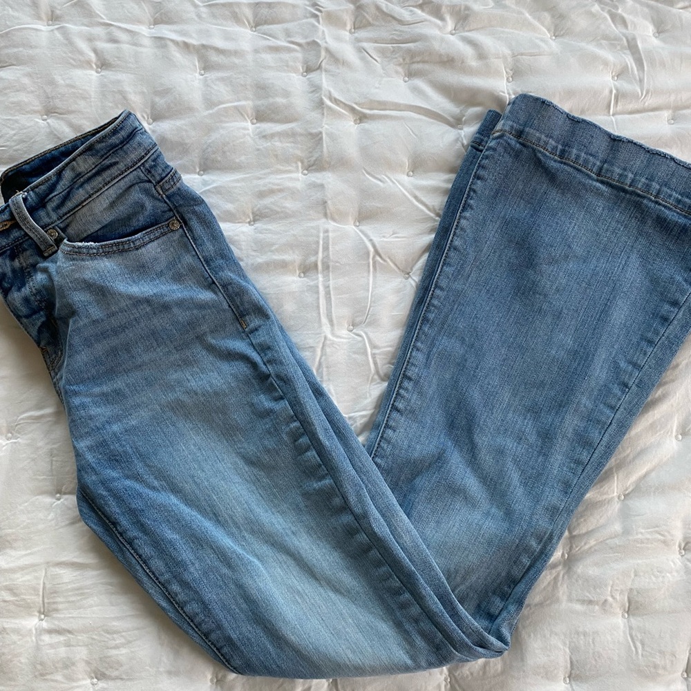 light wash Buckle boot cut flare jeans